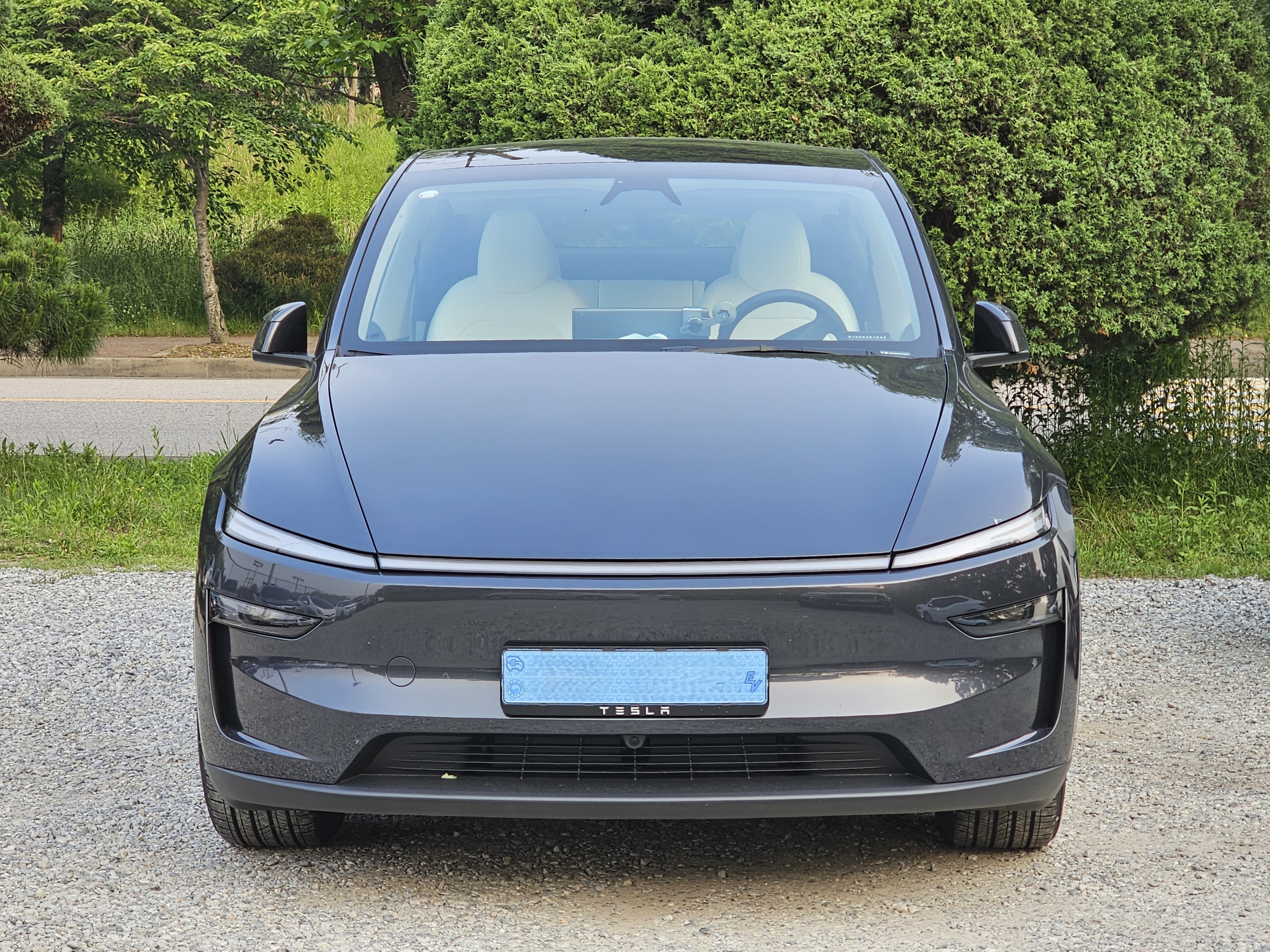 Tesla Model Y (2026), front view by day